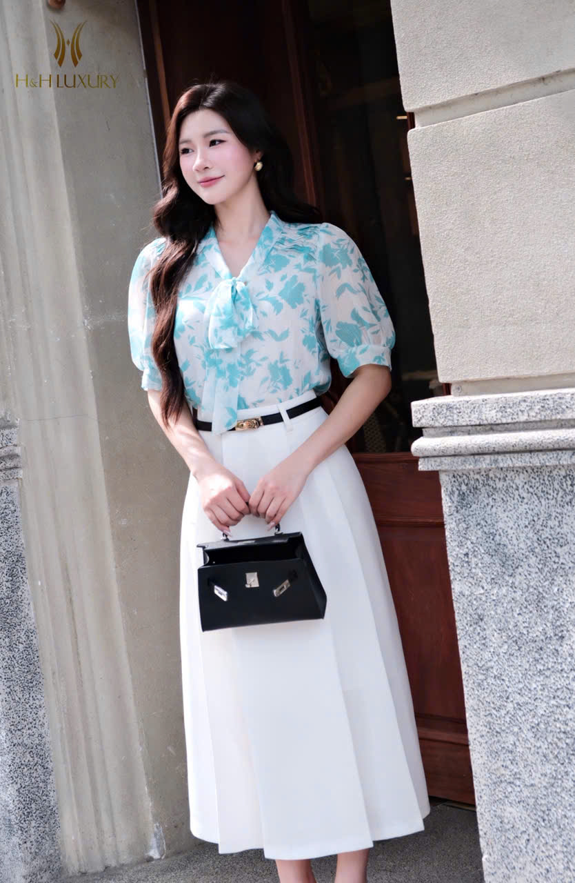 CHÂN VÁY TRẮNG XÒE XẾP LY