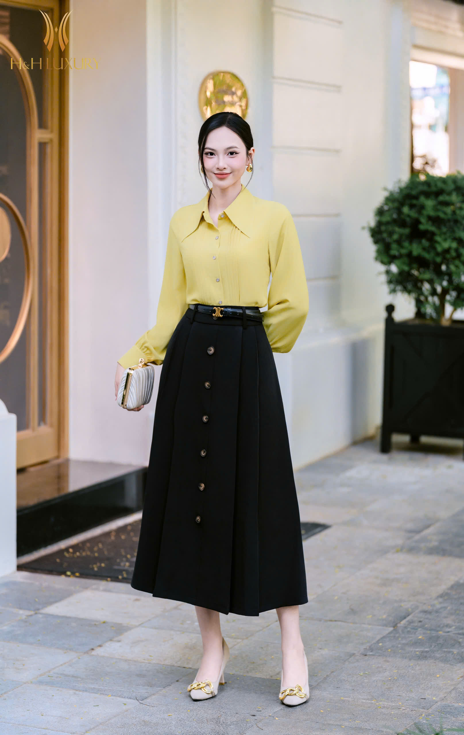 CHÂN VÁY XẾP LY ĐÍNH CÚC TÚI SƯỜN