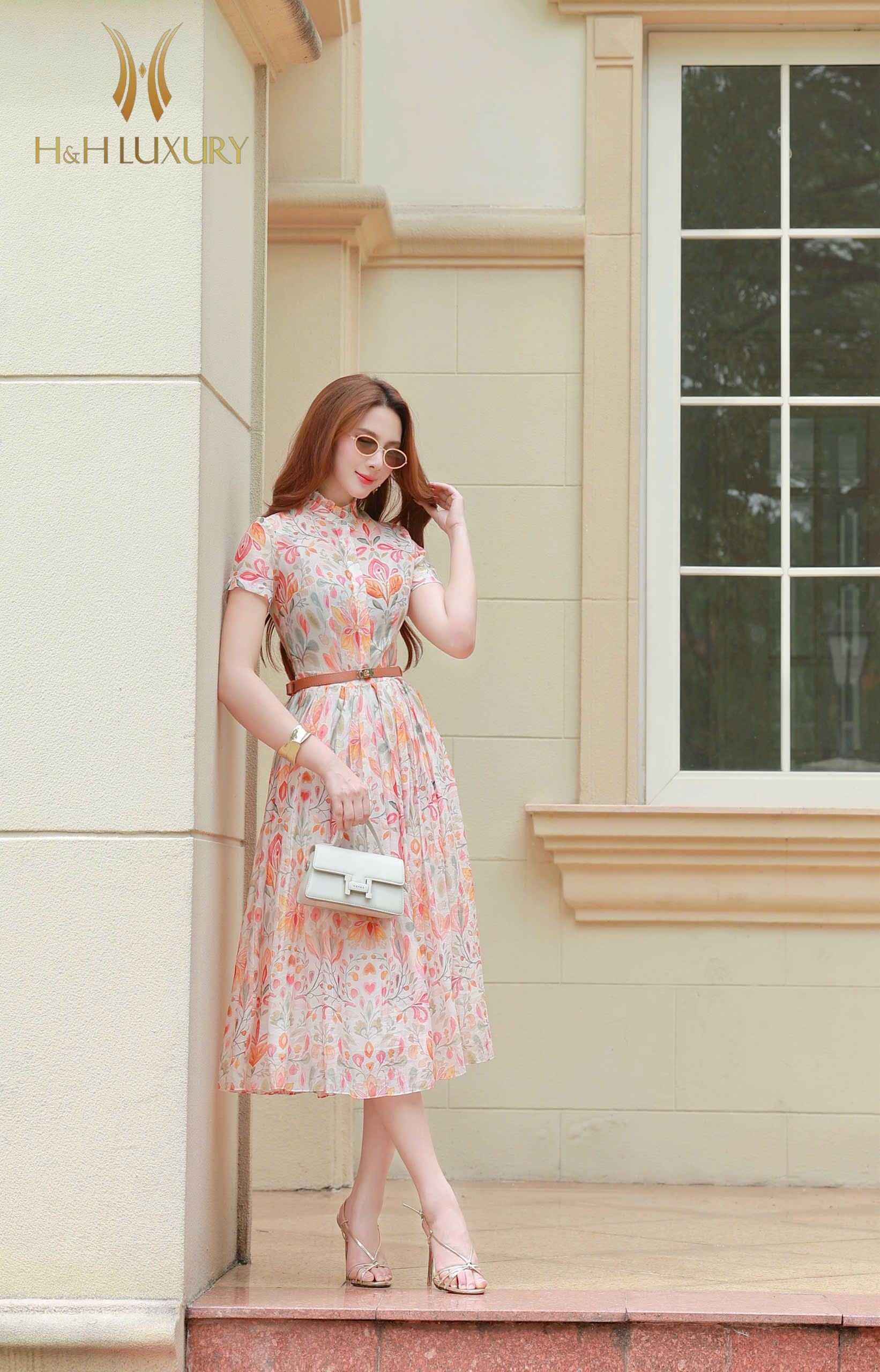 ĐẦM XÒE HOA CAM XẾP LY THÂN
