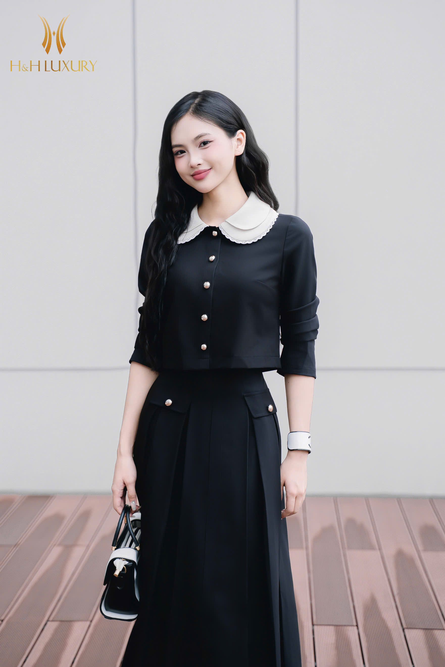 CHÂN VÁY XẾP LY TÚI SƯỜN ĐÍNH CÚC