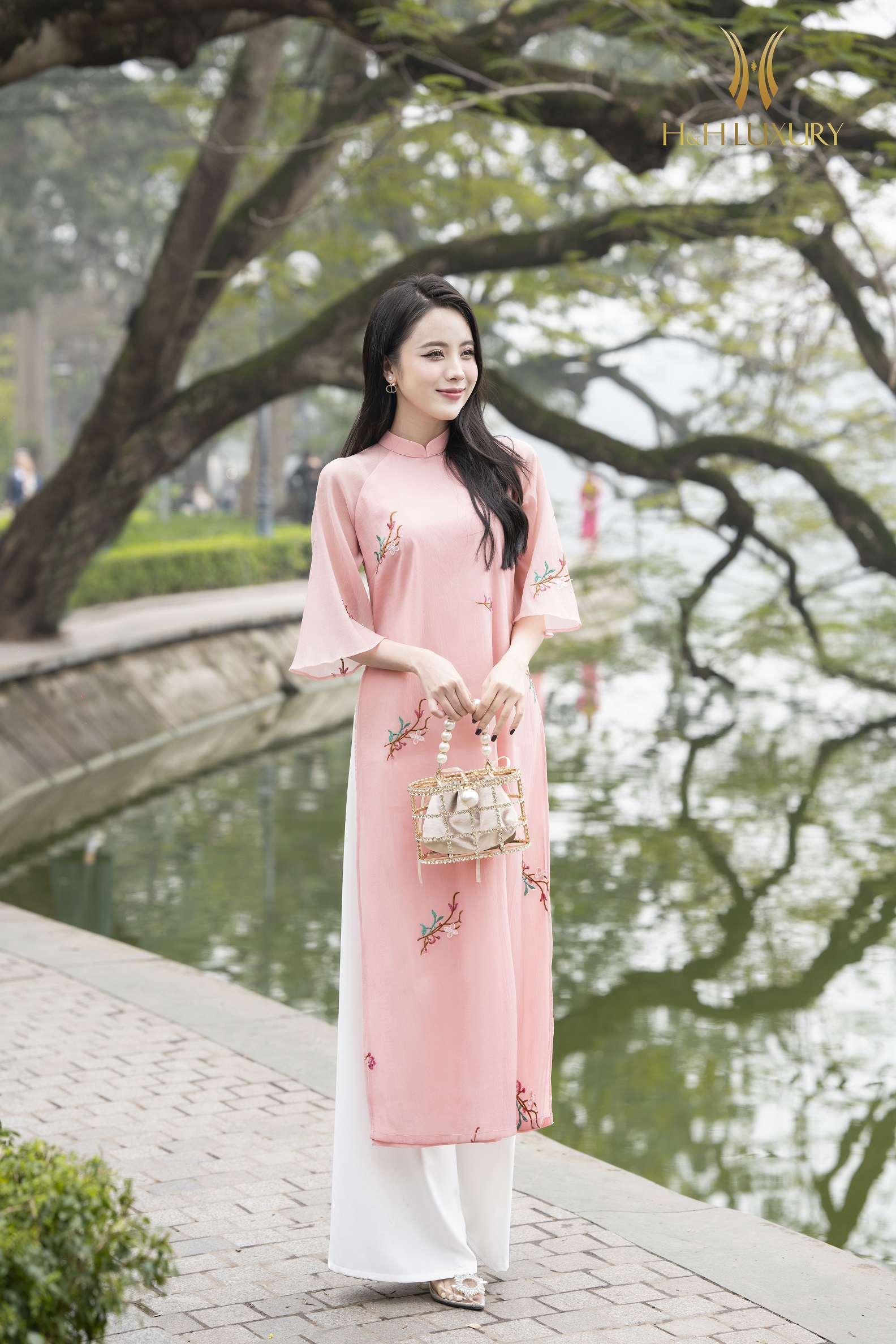 ÁO DÀI TƠ  HỒNG CAM THÊU HOA