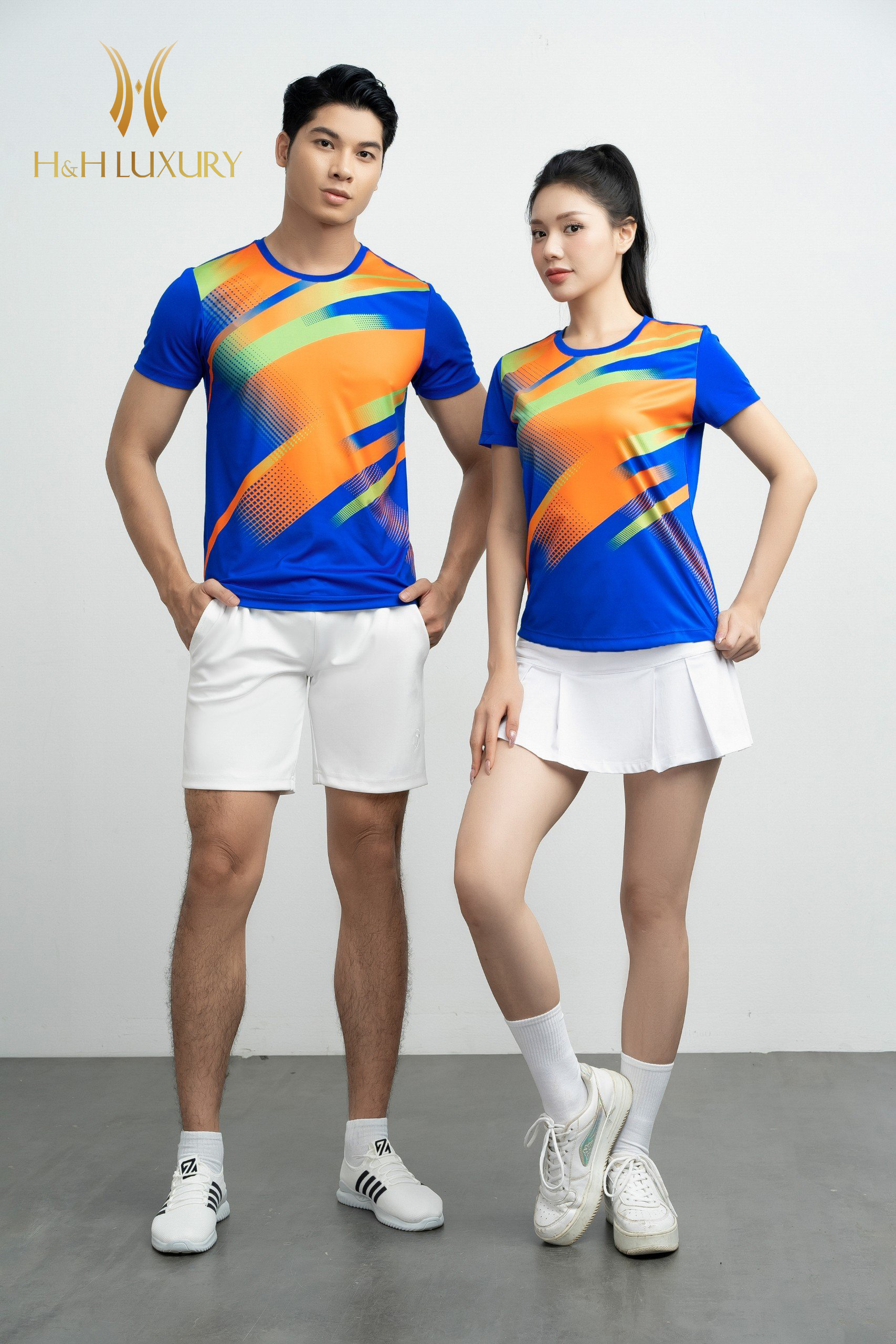 ÁO PRONING NỮ MÀU XANH NGỌC BÍCH PHỐI CAM IN CHUYỂN NHIỆT