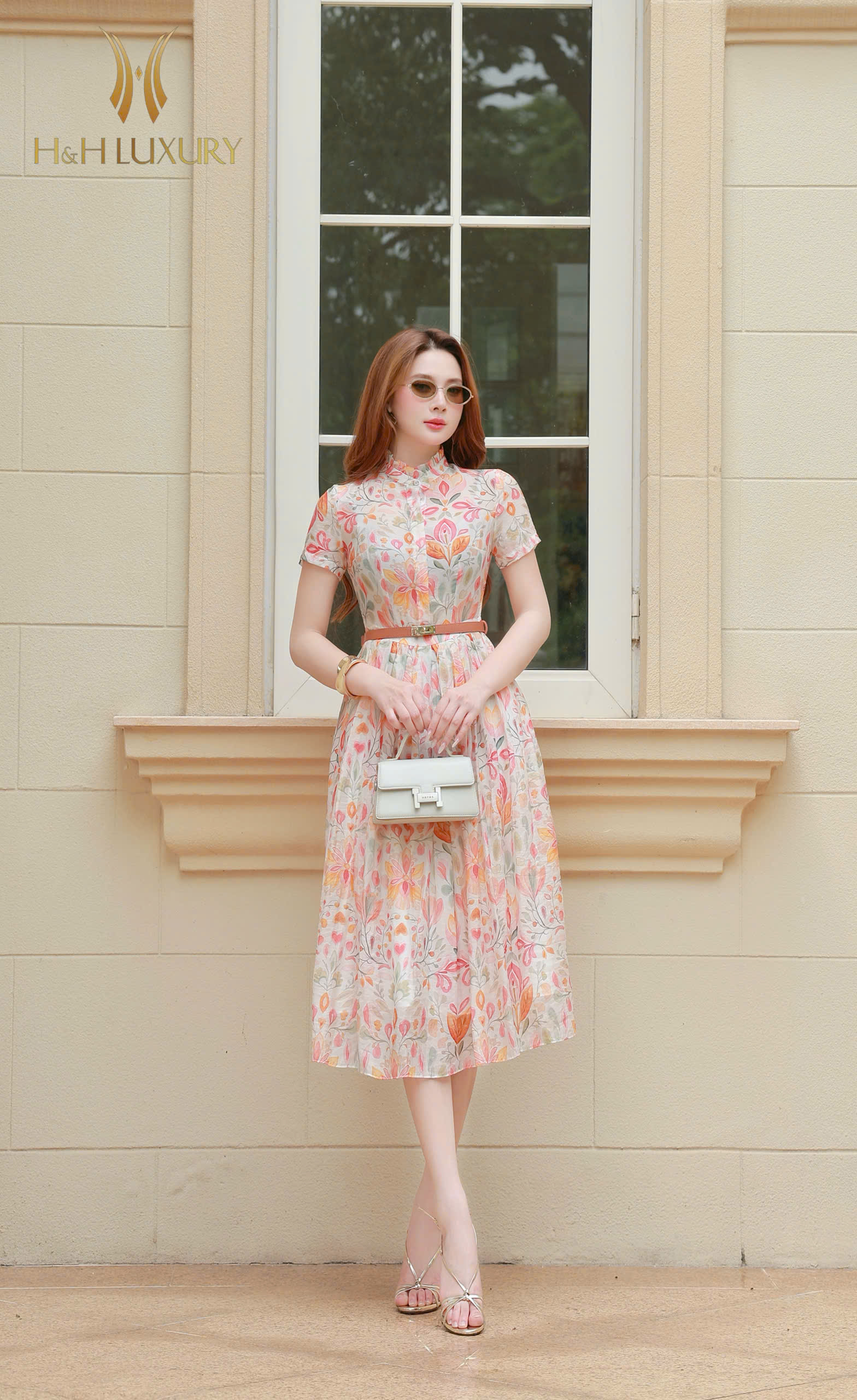 ĐẦM XÒE HOA CAM XẾP LY THÂN