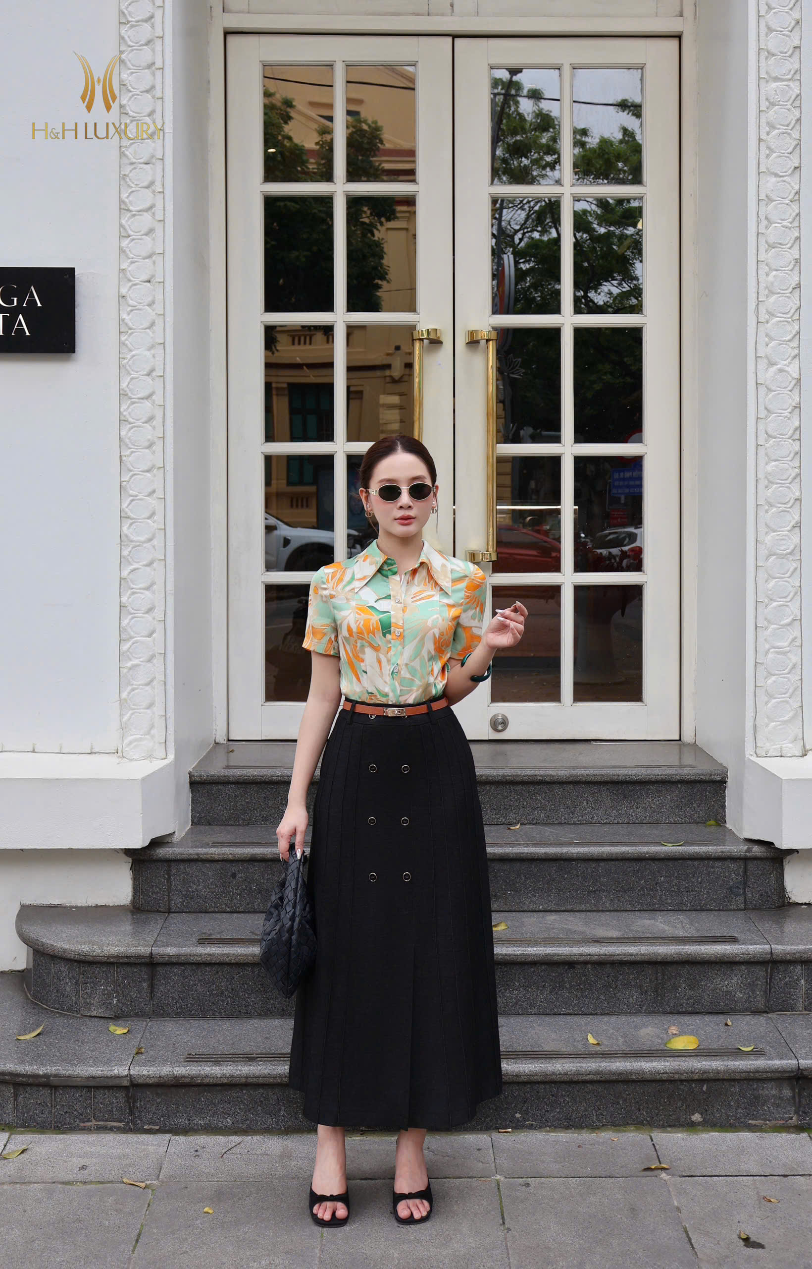 CHÂN VÁY A JEAN ĐEN BẤU LY ĐÍNH CÚC