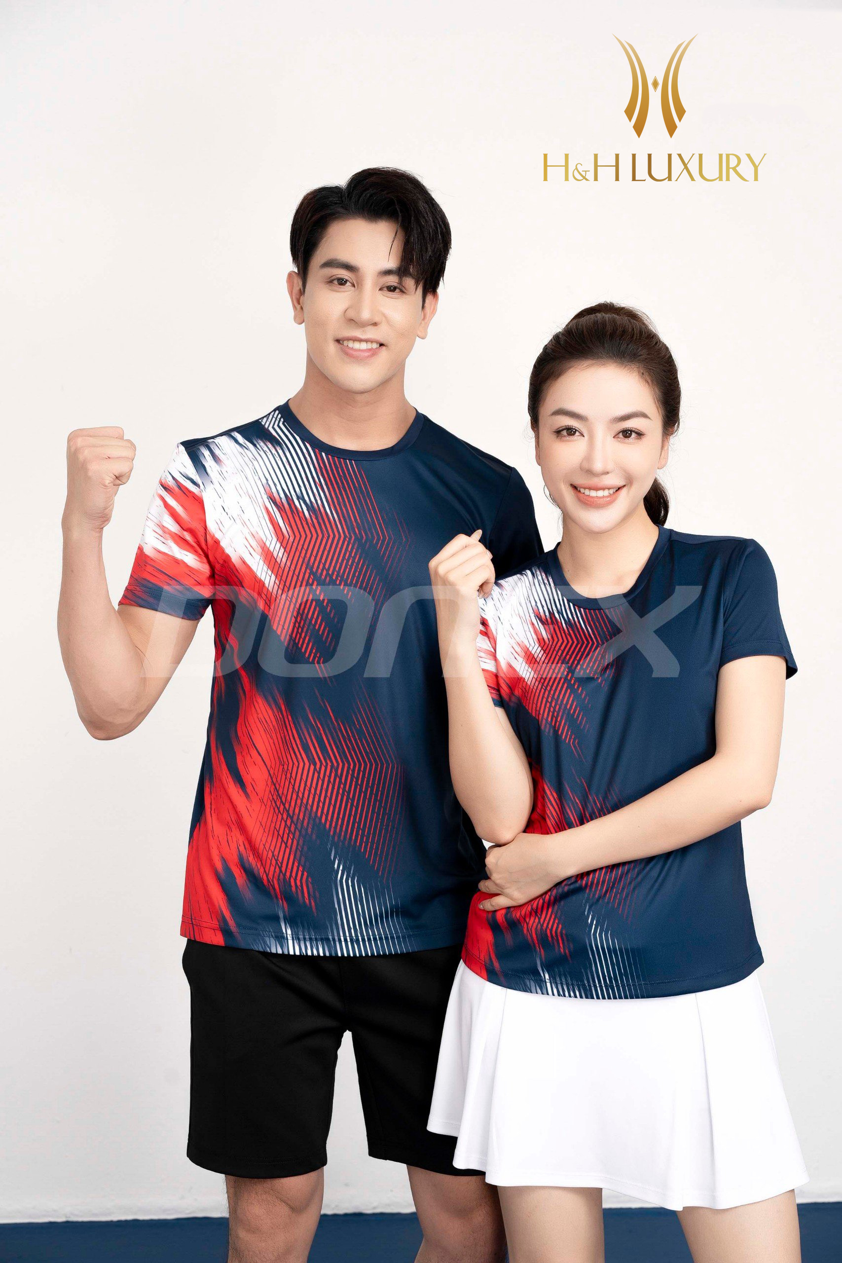 ÁO THỂ THAO NỮ NAVY PHỐI ĐỎ